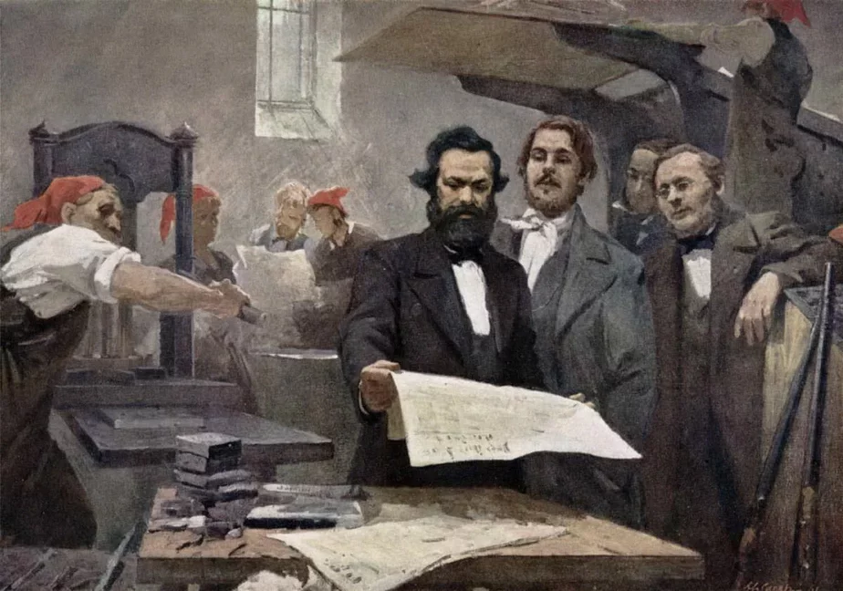 Маркс і Энгельс у «Рэйнскай газеце». Адзін рэдактар, другі — яго намеснік. Карціна рэвалюцыйнага для Нямеччыны 1849 года, адсюль адпаведная стылістыка. Крыніца: wikimedia.commons
